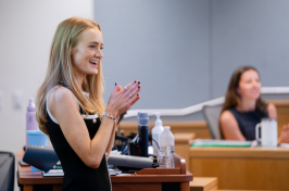 Emma Frank lectures at the front of a Paul College classroom.